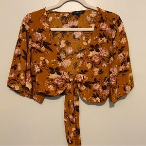 Super cute vintage coverup with a tie in the front. 🧡